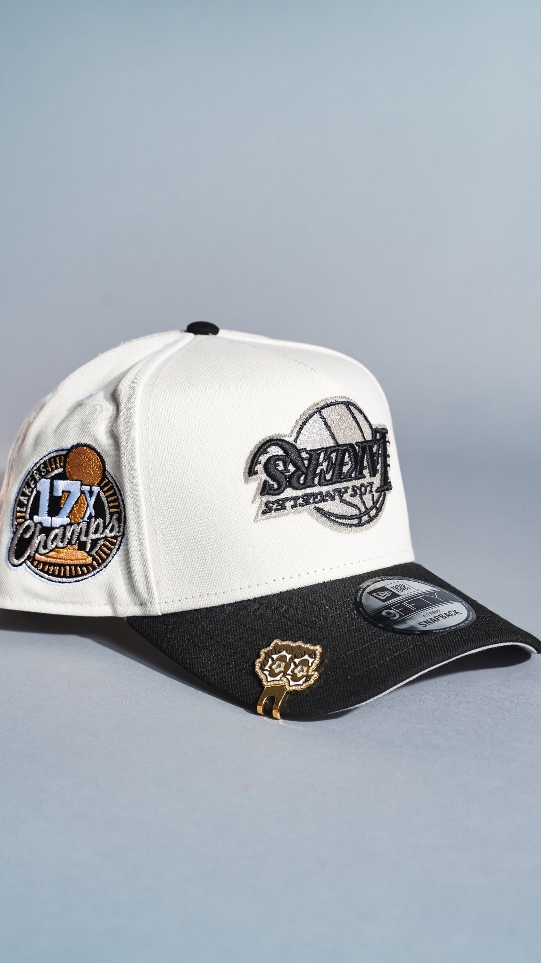 NEW ERA 9FIFTY A-FRAME CHROME/BLACK UPSIDE DOWN LOS ANGELES LAKERS SNAPBACK W/ 17X CHAMPIONS SIDE PATCH