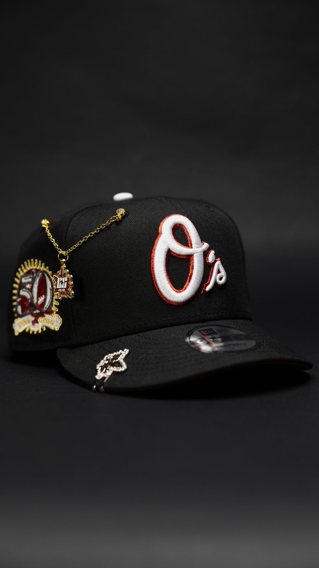 NEW ERA EXCLUSIVE 9FIFTY BLACK BALTIMORE ORIOLES SNAPBACK W/ 50H ANNIVERSARY SIDE PATCH