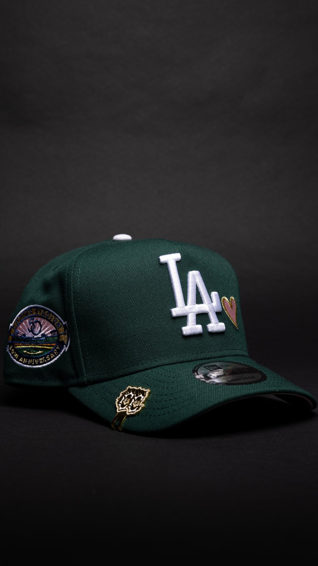 NEW ERA 9FIFTY A-FRAME FOREST GREEN LOS ANGELES DODGERS W/ PINK HEART + 50TH ANNIVERSARY SIDE PATCH