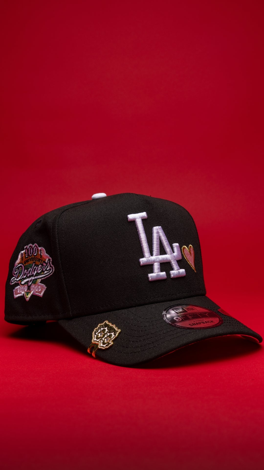 NEW ERA 9FIFTY A-FRAME BLACK LOS ANGELES DODGERS SNAPBACK W/ PINK HEART + 100TH ANNIVERSARY SIDE PATCH