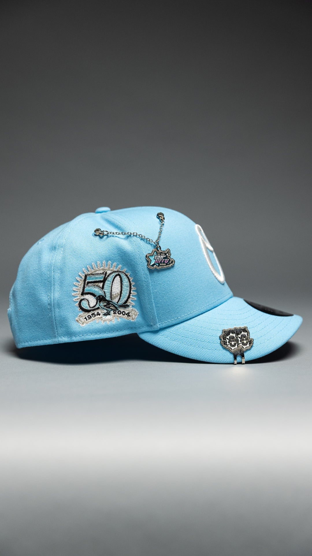 NEW ERA EXCLUSIVE 9FIFTY ICY BLUE BALTIMORE ORIOLES SNAPBACK W/ 50TH ANNIVERSARY SIDE PATCH