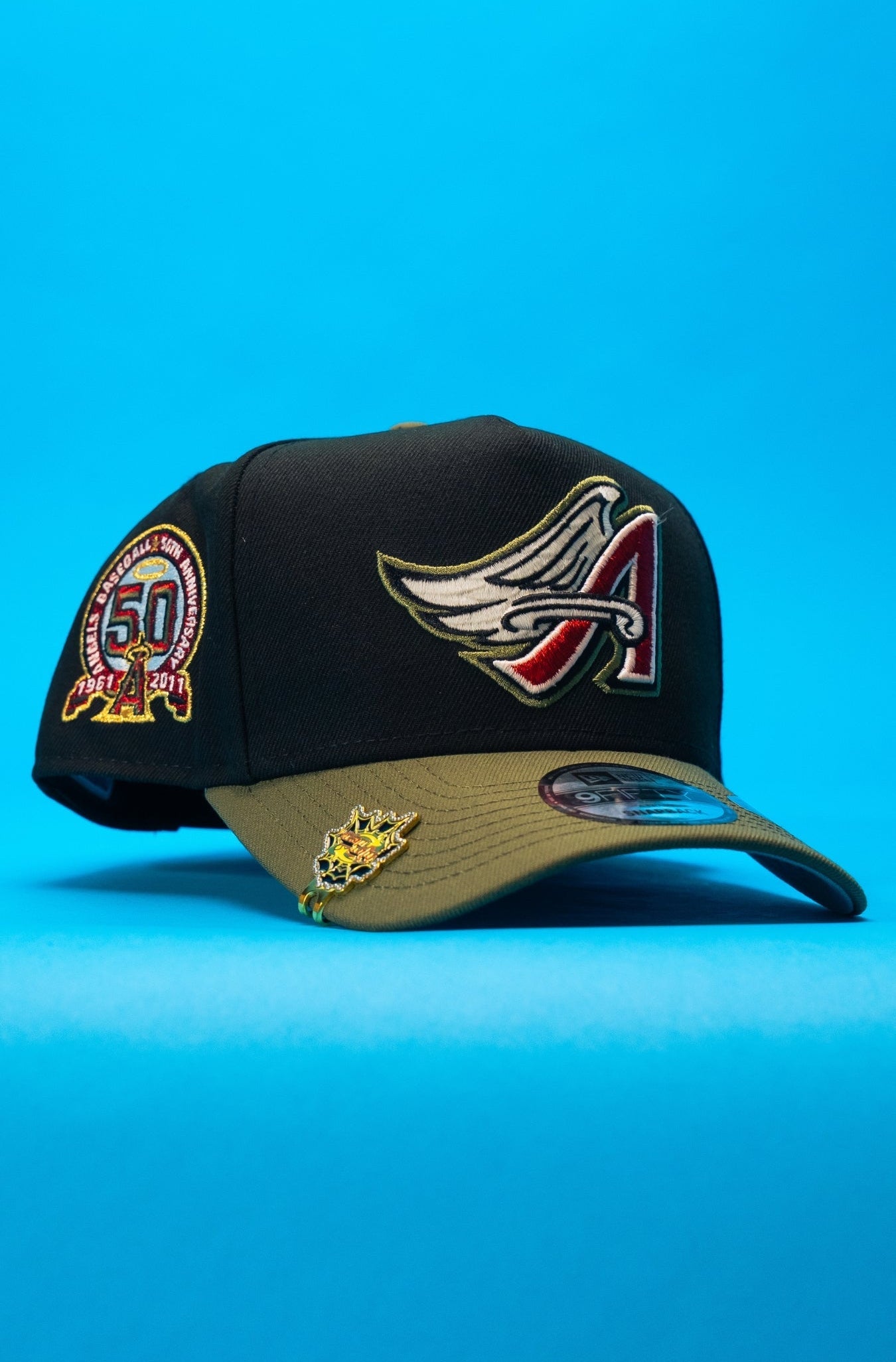 NEW ERA 9FIFTY A-FRAME BLACK/OLIVE ANAHEIM ANGELS SNAPBACK W/ 50TH ANNIVERSARY SIDE PATCH