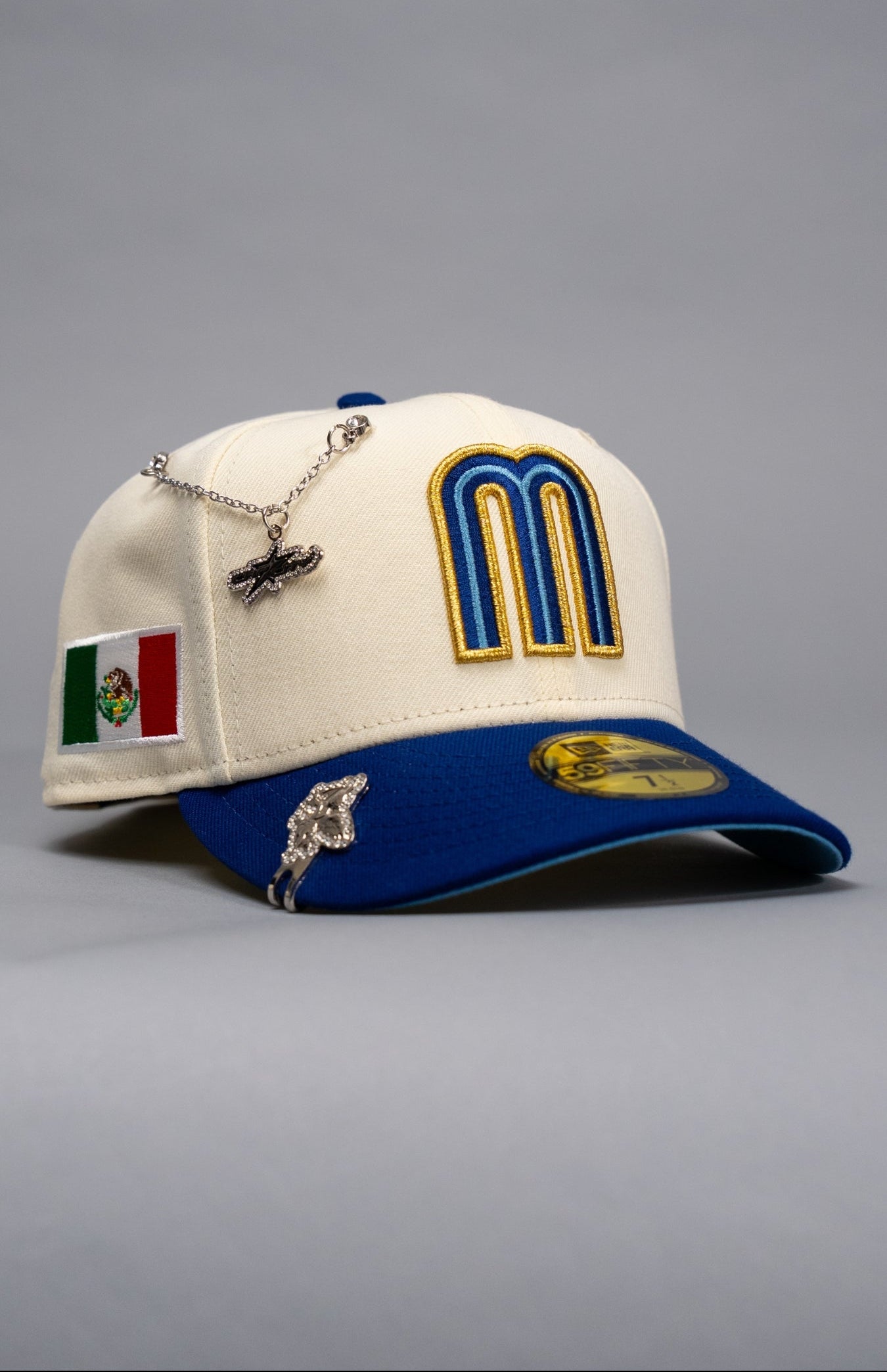 NEW ERA EXCLUSIVE 59FIFTY CHROME/BLUE MEXICO 2025 WORLD BASEBALL CLASSIC W/ MEXICO FLAG SIDE PATCH