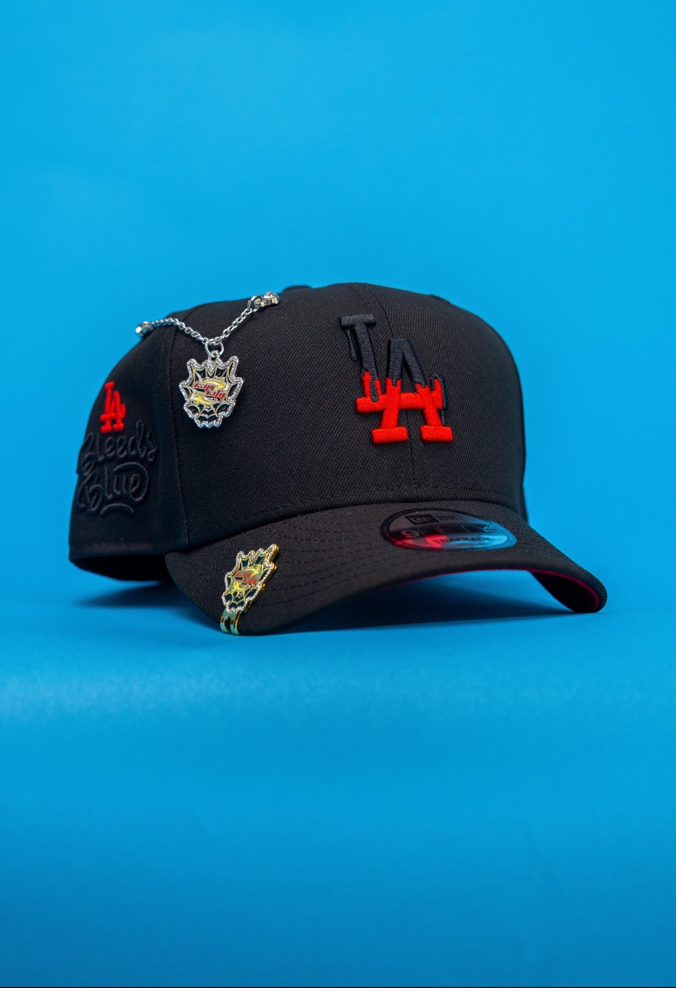 NEW ERA EXCLUSIVE 9FIFTY BLACK LOS ANGELES DODGERS SNAPBACK W/ "LA BLEEDS BLUE"SIDE PATCH