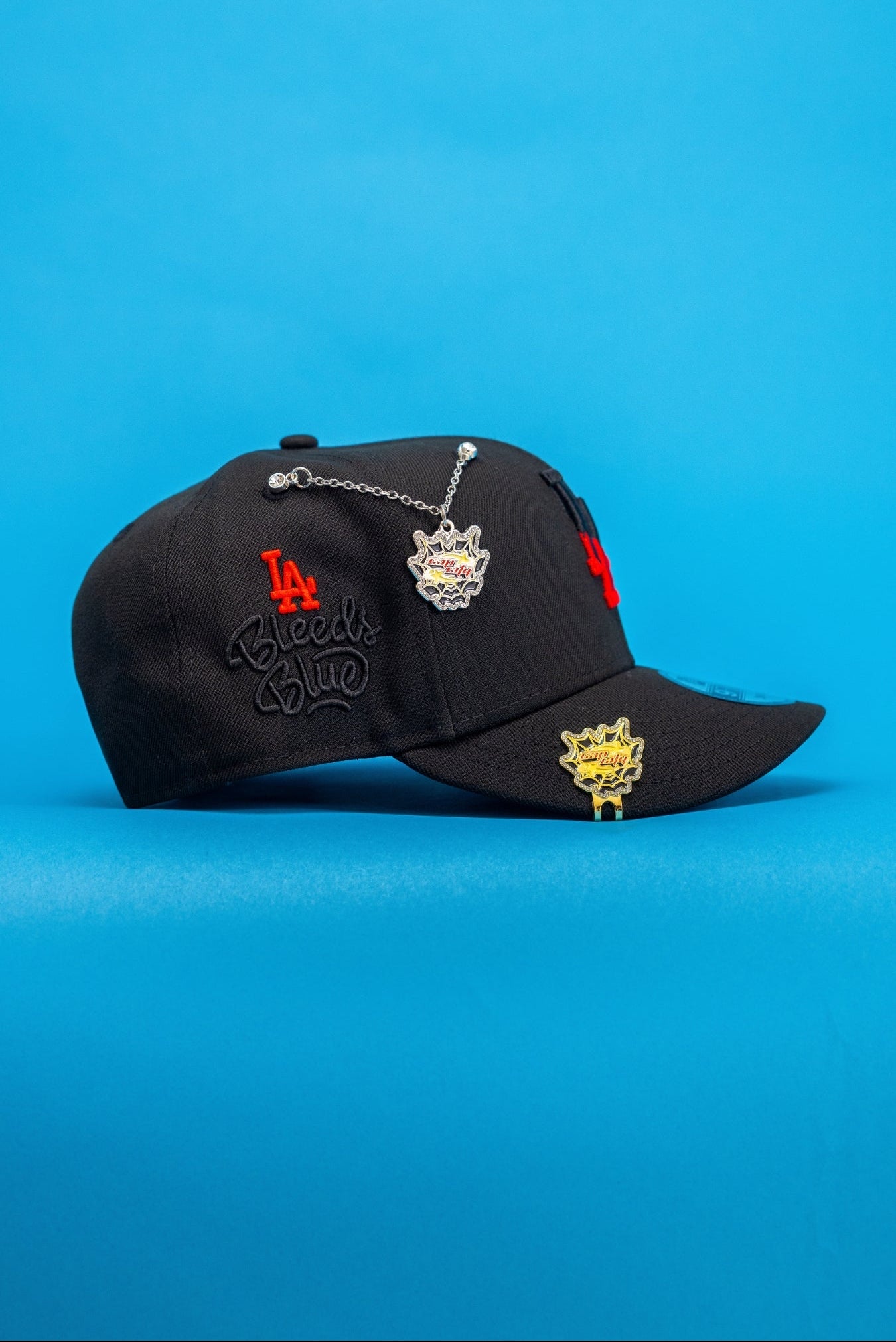 NEW ERA EXCLUSIVE 9FIFTY BLACK LOS ANGELES DODGERS SNAPBACK W/ "LA BLEEDS BLUE"SIDE PATCH