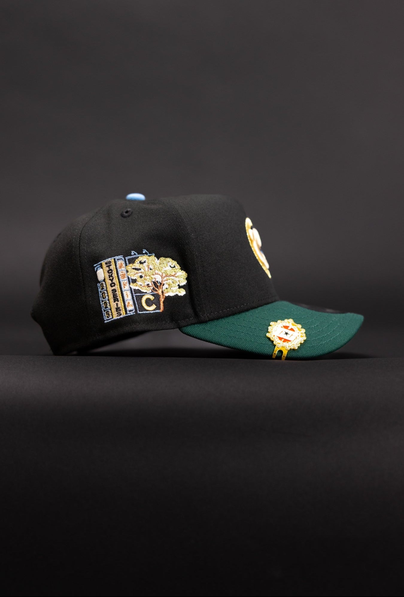 NEW ERA 9FIFTY A-FRAME BLACK/FOREST GREEN CHICAGO CUBS SNAPBACK W/ TOKYO SERIES SIDE PATCH