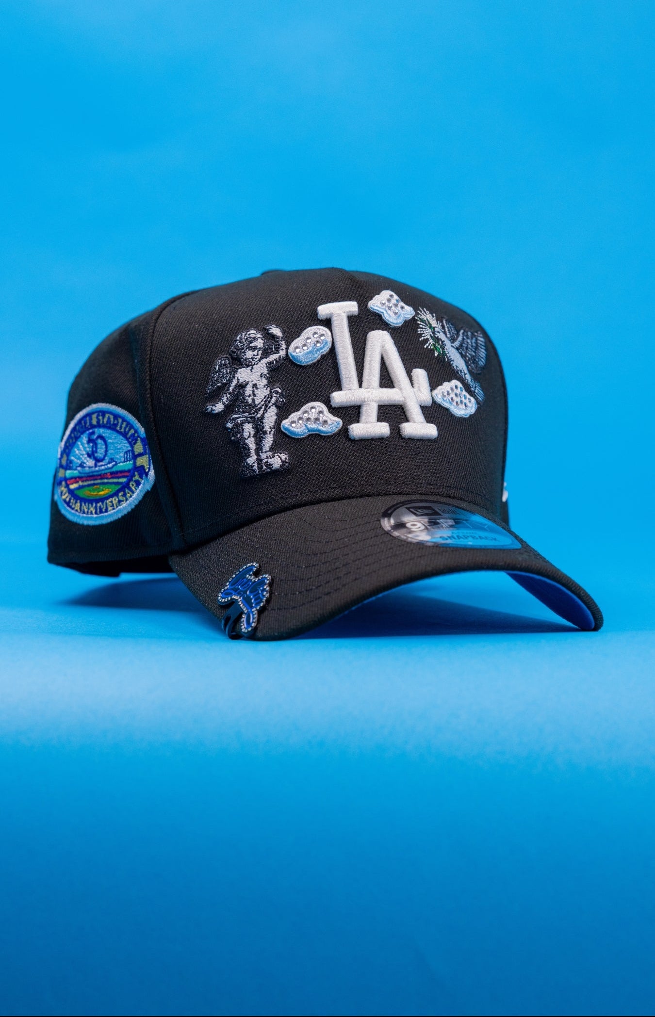 NEW ERA EXCLUSIVE 9FIFTY A-FRAME BLACK LOS ANGELES DODGERS "HEAVENLY CITY" W/ 50TH ANNIVERSARY SIDE PATCH