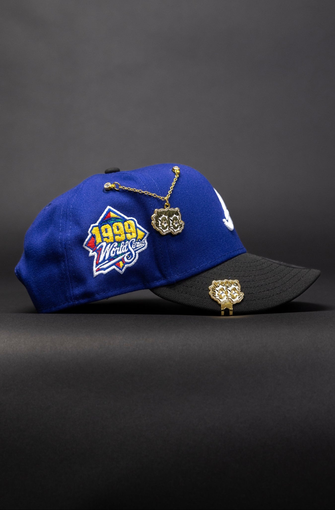 NEW ERA EXCLUSIVE 9FIFTY BLUE/BLACK ATLANTA BRAVES SNAPBACK W/ 1999 WORLD SERIES SIDE PATCH