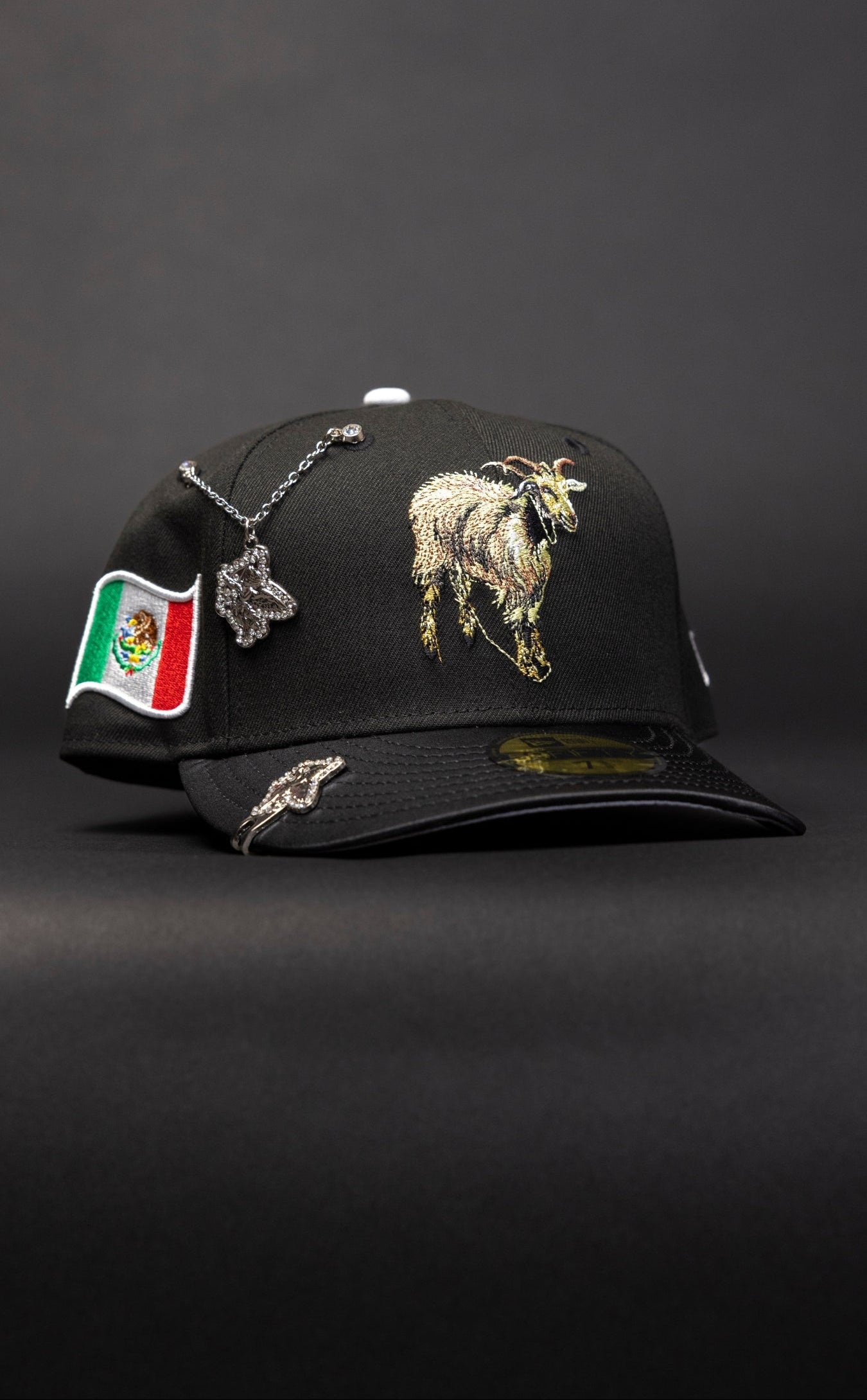 NEW ERA EXCLUSIVE 59FIFTY BLACK/SATIN EL CHIVO W/ MEXICAN FLAG SIDE PATCH
