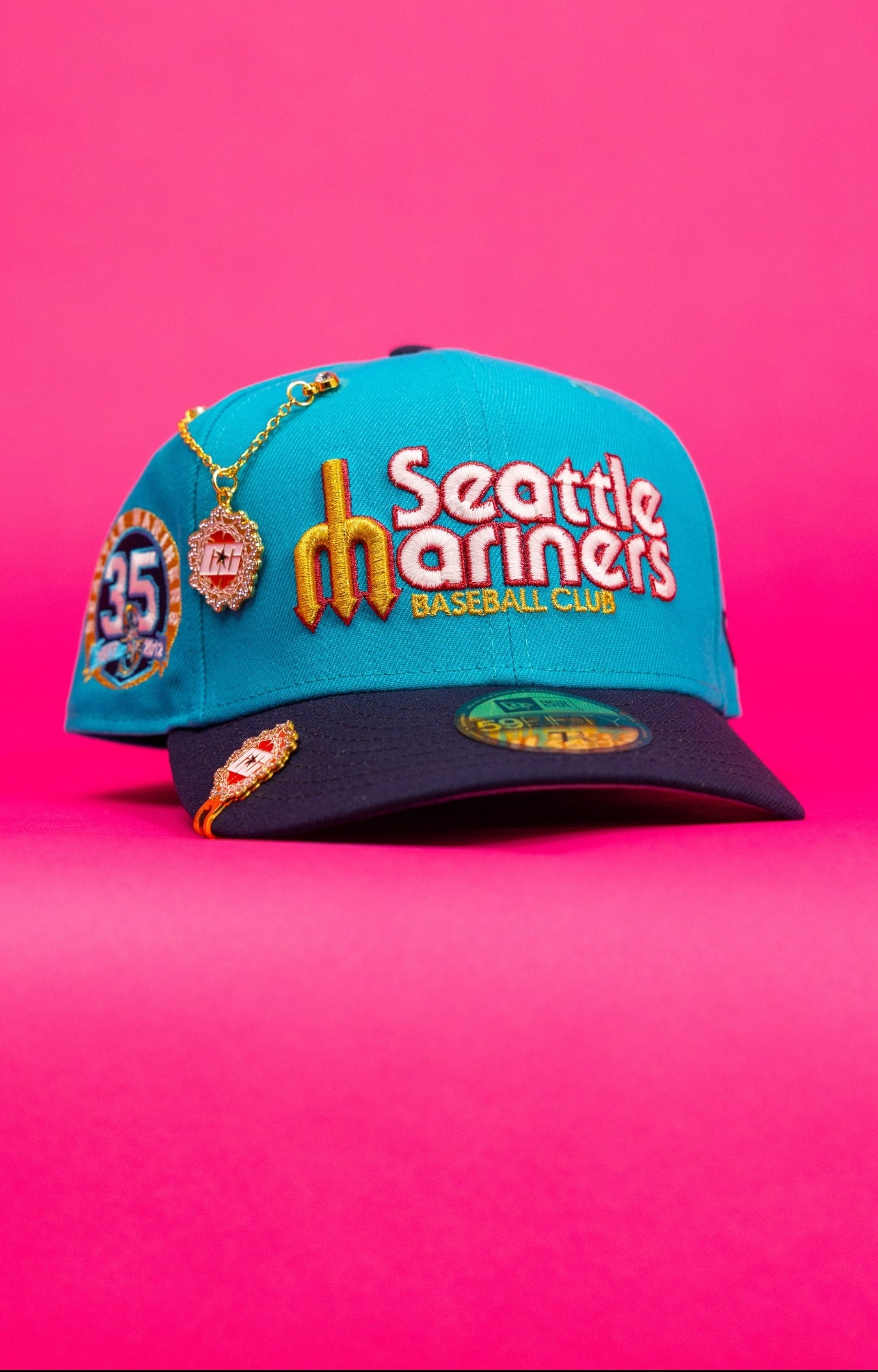 NEW ERA EXCLUSIVE 59FIFTY TEAL/NAVY SEATTLE MARINERS SCRIPT W/ 35TH ANNIVERSARY SIDE PATCH