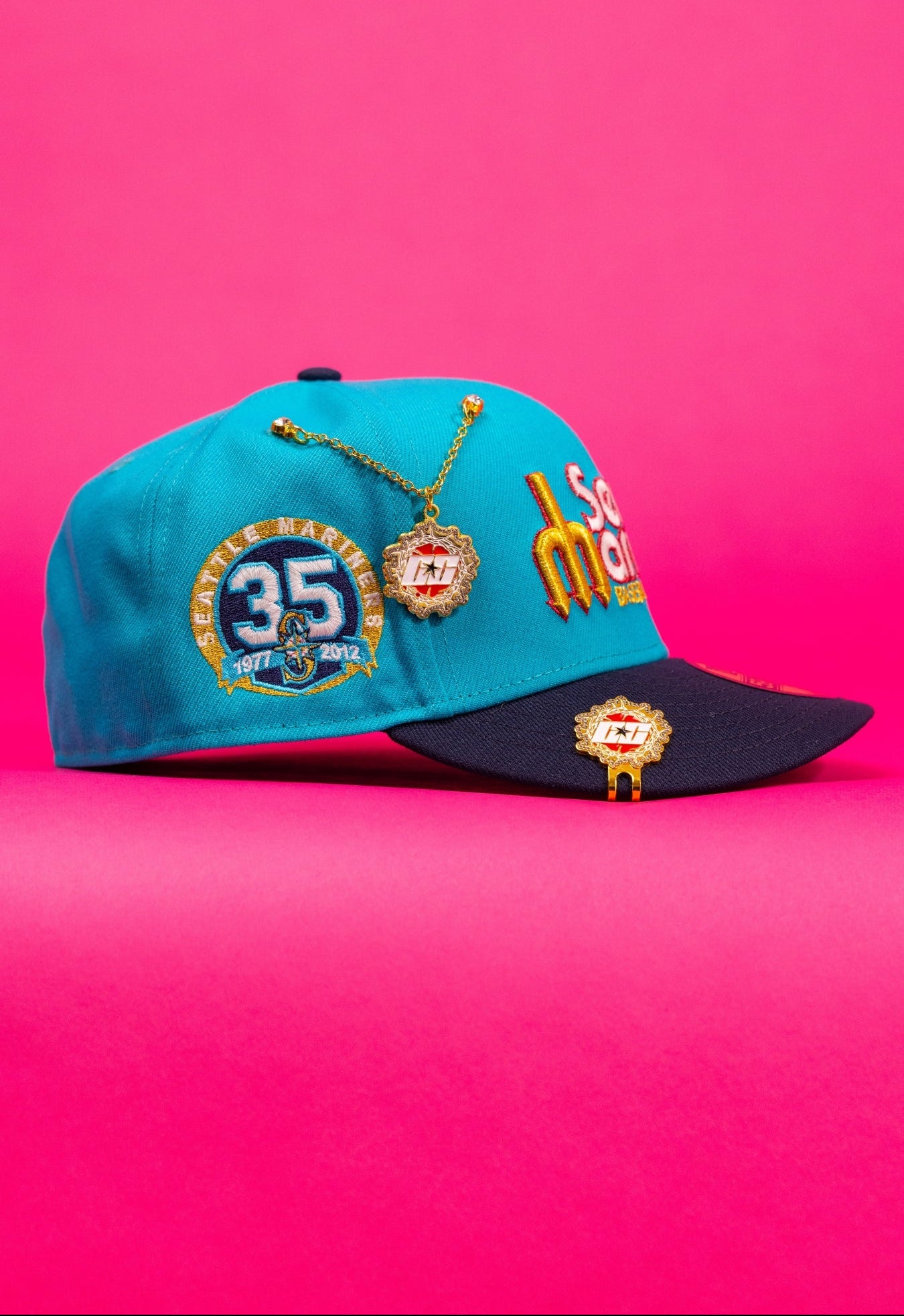 NEW ERA EXCLUSIVE 59FIFTY TEAL/NAVY SEATTLE MARINERS SCRIPT W/ 35TH ANNIVERSARY SIDE PATCH