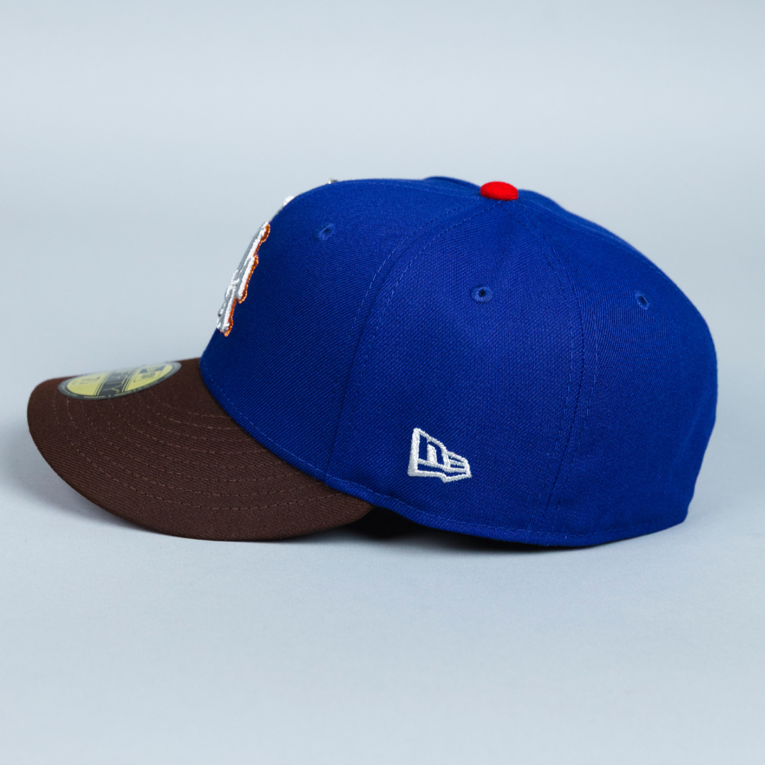 NEW ERA EXCLUSIVE 59FIFTY DARK BLUE/ BROWN LOS ANGELES ANGELS W/ 50TH ANNIVERSARY SIDE PATCH