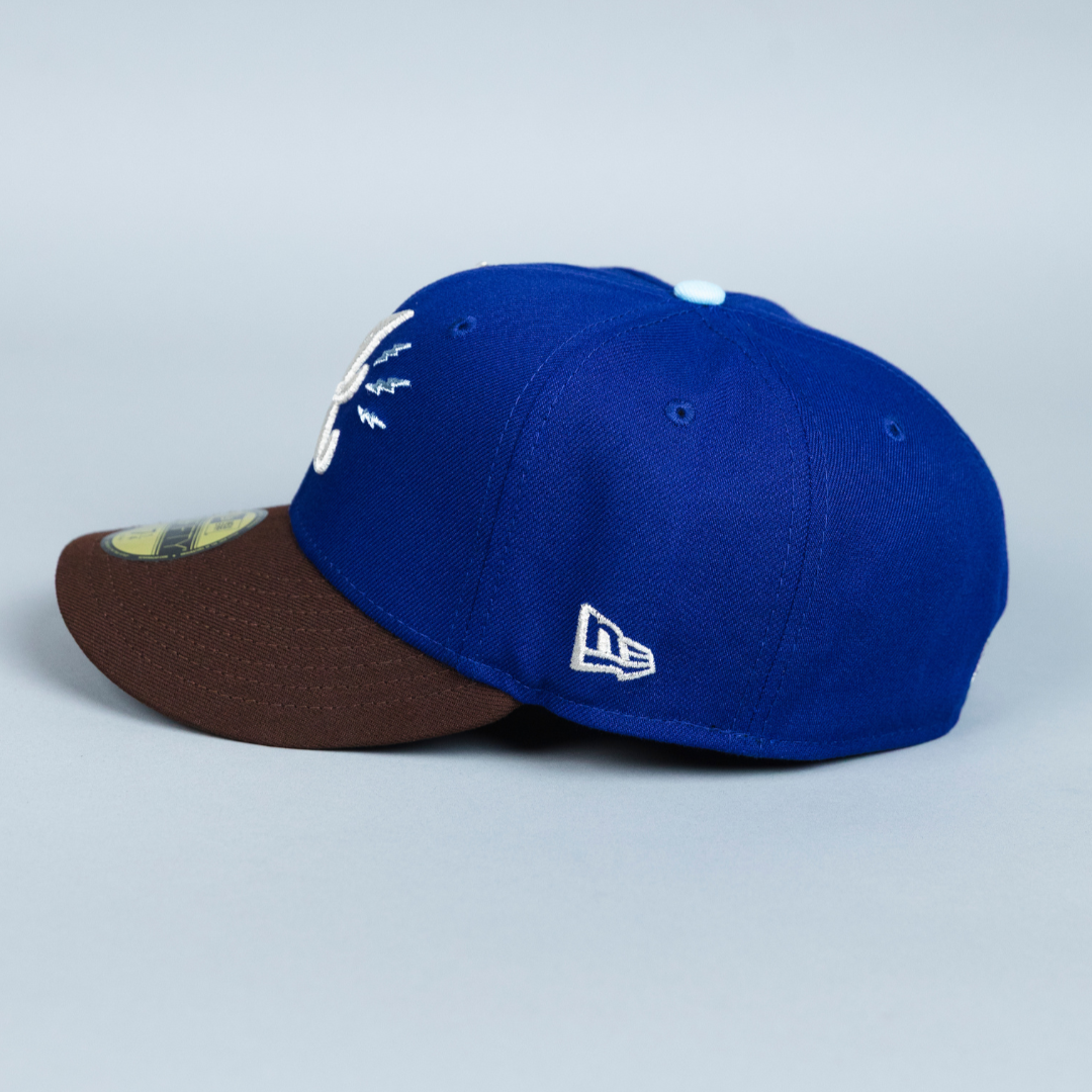 NEW ERA EXCLUSIVE 59FIFTY DARK BLUE/ BROWN ATLANTA BRAVES W/ 1999 WORLD SERIES SIDE PATCH
