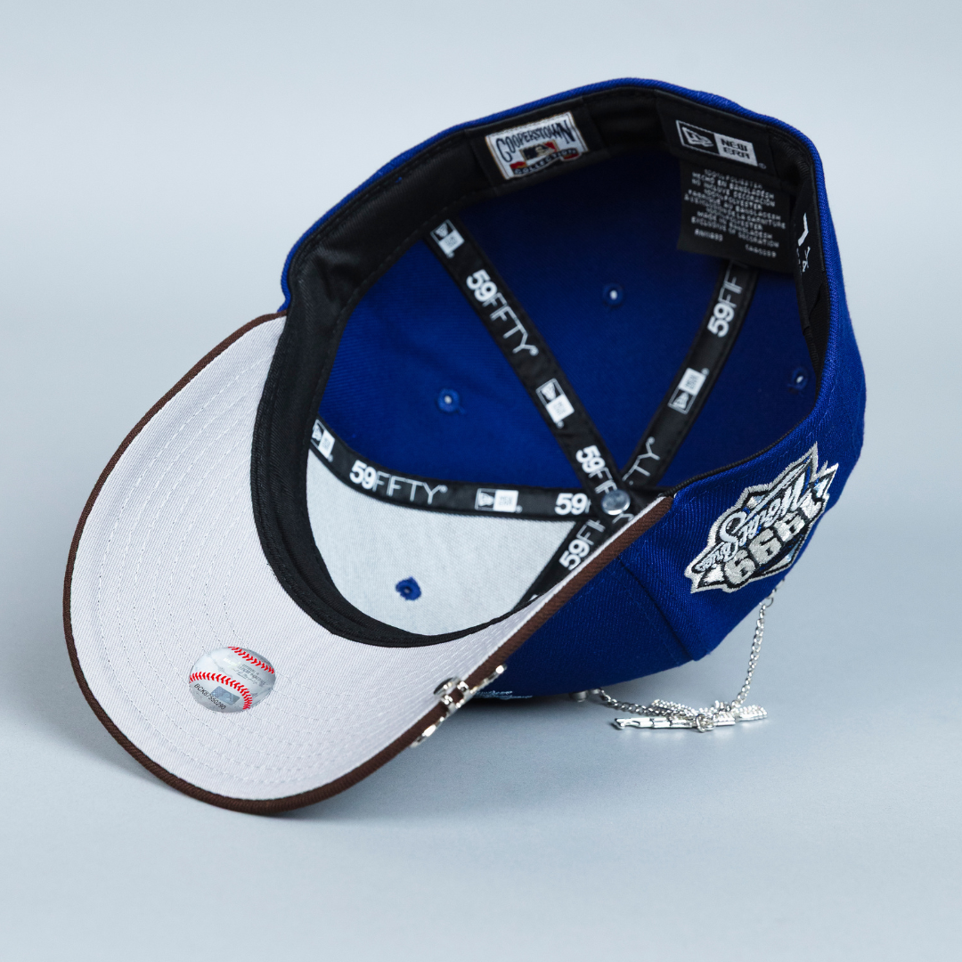 NEW ERA EXCLUSIVE 59FIFTY DARK BLUE/ BROWN ATLANTA BRAVES W/ 1999 WORLD SERIES SIDE PATCH