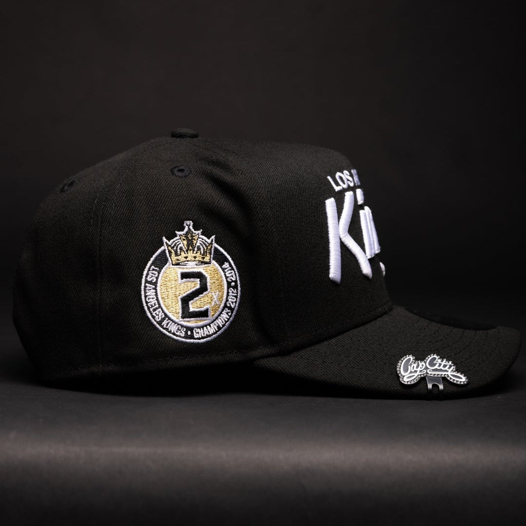 NEW ERA 9FIFTY A-FRAME BLACK LOS ANGELES KINGS SCRIPT SNAPBACK W/ 2012 NHL CHAMPIONS SIDE PATCH