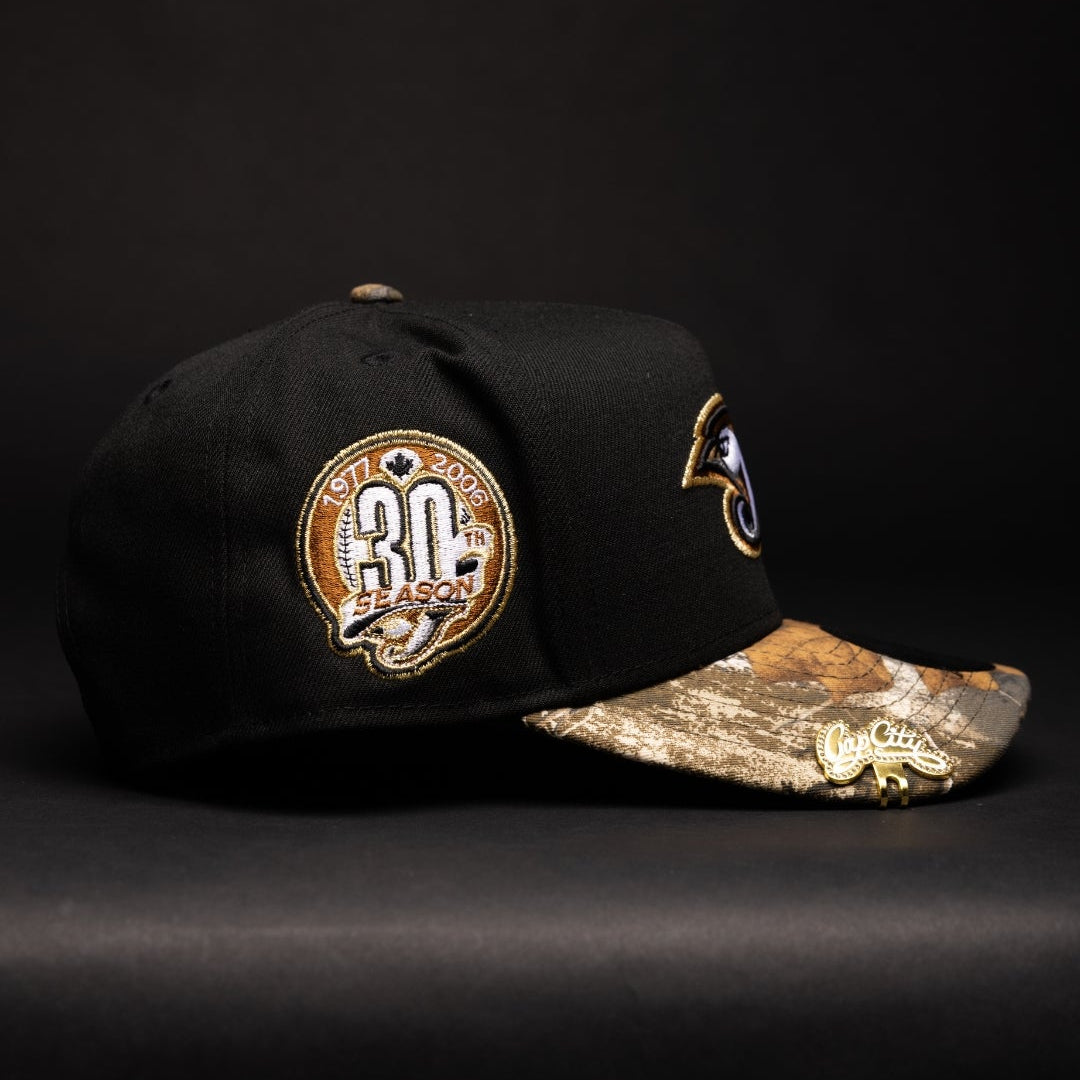 NEW ERA 9FIFTY A-FRAME BLACK/REALTREE TORONTO BLUE JAYS SNAPBACK W/ 30TH ANNIVERSARY SIDE PATCH