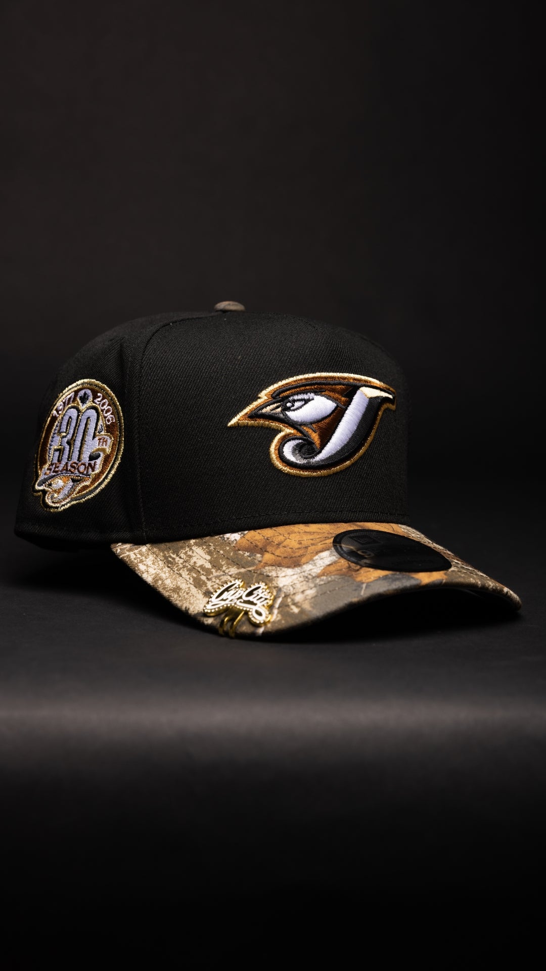 NEW ERA 9FIFTY A-FRAME BLACK/REALTREE TORONTO BLUE JAYS SNAPBACK W/ 30TH ANNIVERSARY SIDE PATCH