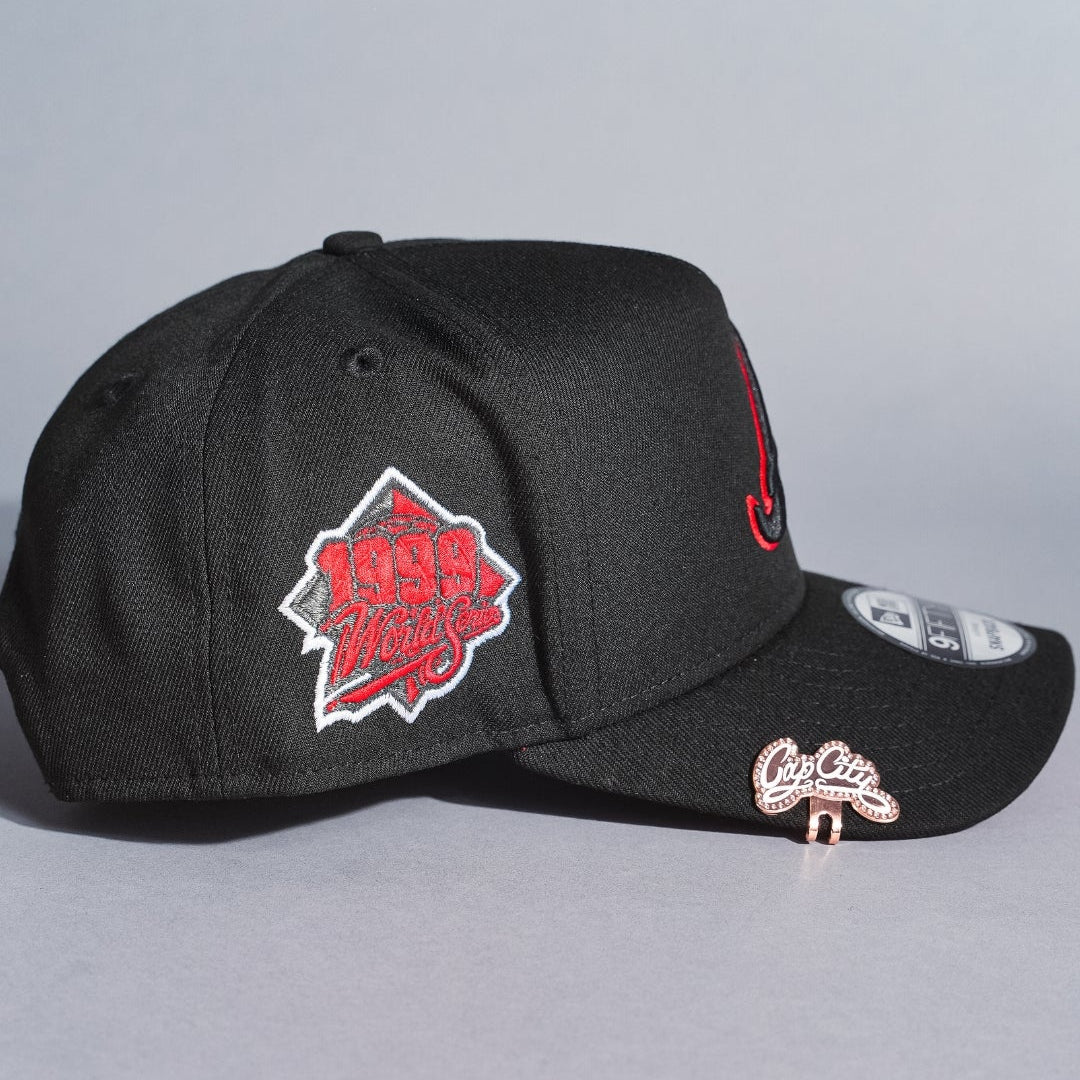 NEW ERA 9FIFTY A-FRAME BLACK ATLANTA BRAVES SNAPBACK W/ OUTLINE + 1999 WORLD SERIES SIDE PATCH