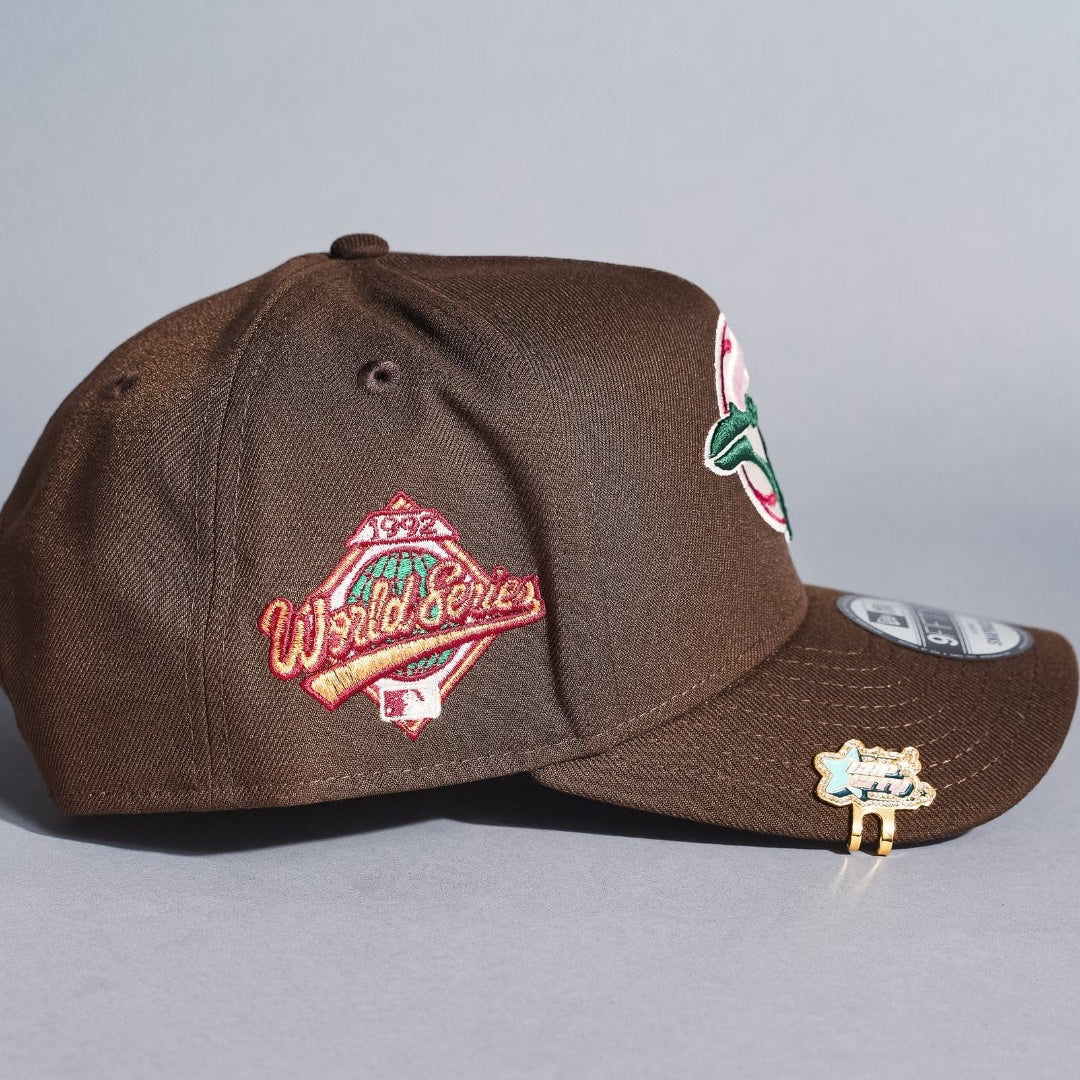 NEW ERA 9FIFTY A-FRAME BROWN TORONTO BLUE JAYS SNAPBACK W/ FLORAL EMBROIDERY + WORLD SERIES SIDE PATCH
