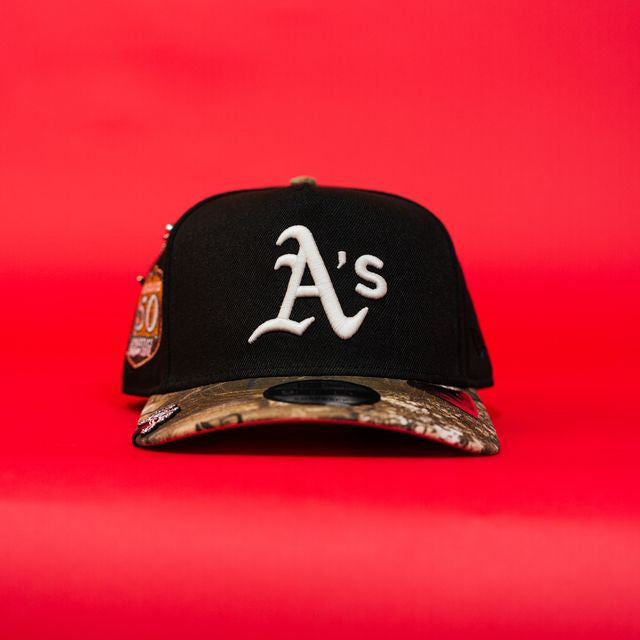 NEW ERA EXCLUSIVE 9FIFTY A-FRAME BLACK/ REALTREE OAKLAND A'S W/ 50TH ANNIVERSARY SIDE PATCH