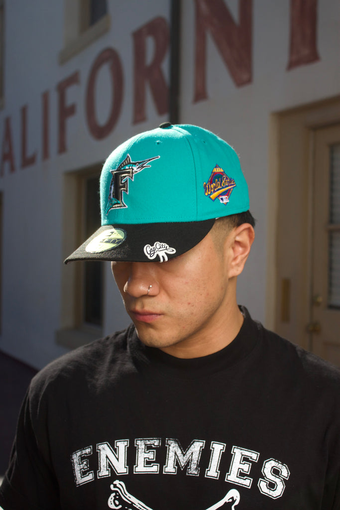 NEW ERA EXCLUSIVE 59FIFTY TEAL/BLACK FLORIDA MARLINS W/ 1997 WORLD SERIES PATCH (GREY UV)